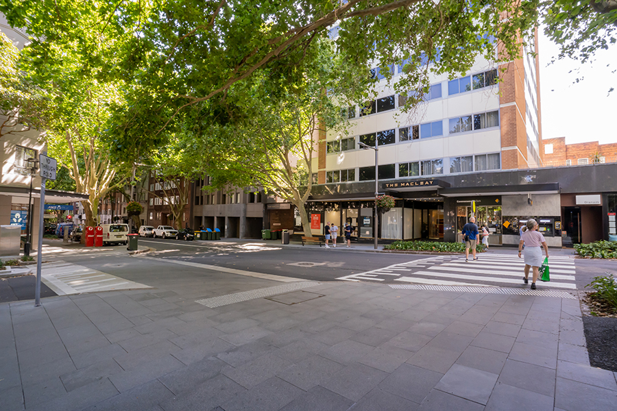 Pedestrians using a crossing on the new Macleay Street, Potts Point, streetscape.