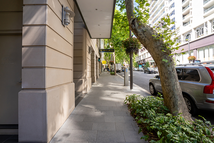 The new streetscape along Macleay Street in Potts Point included new concrete pavers and garden beds.