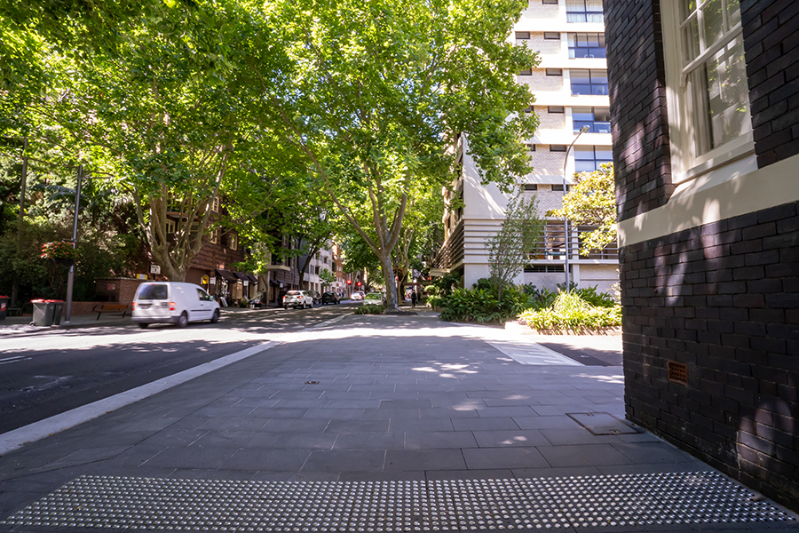The new Macleay Steet streetscape in Potts Point incorporated existing trees into the landscaping.